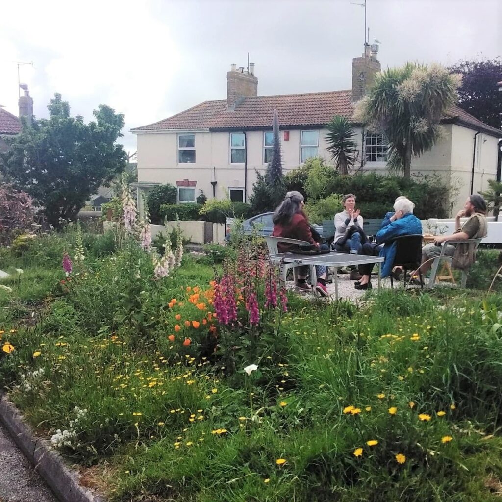 Residents enjoying being outside at Weethes Cottages Community Garden
