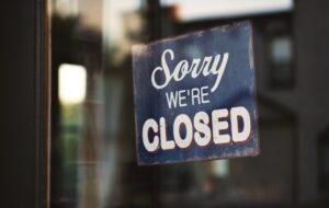 Sorry we're closed window sign