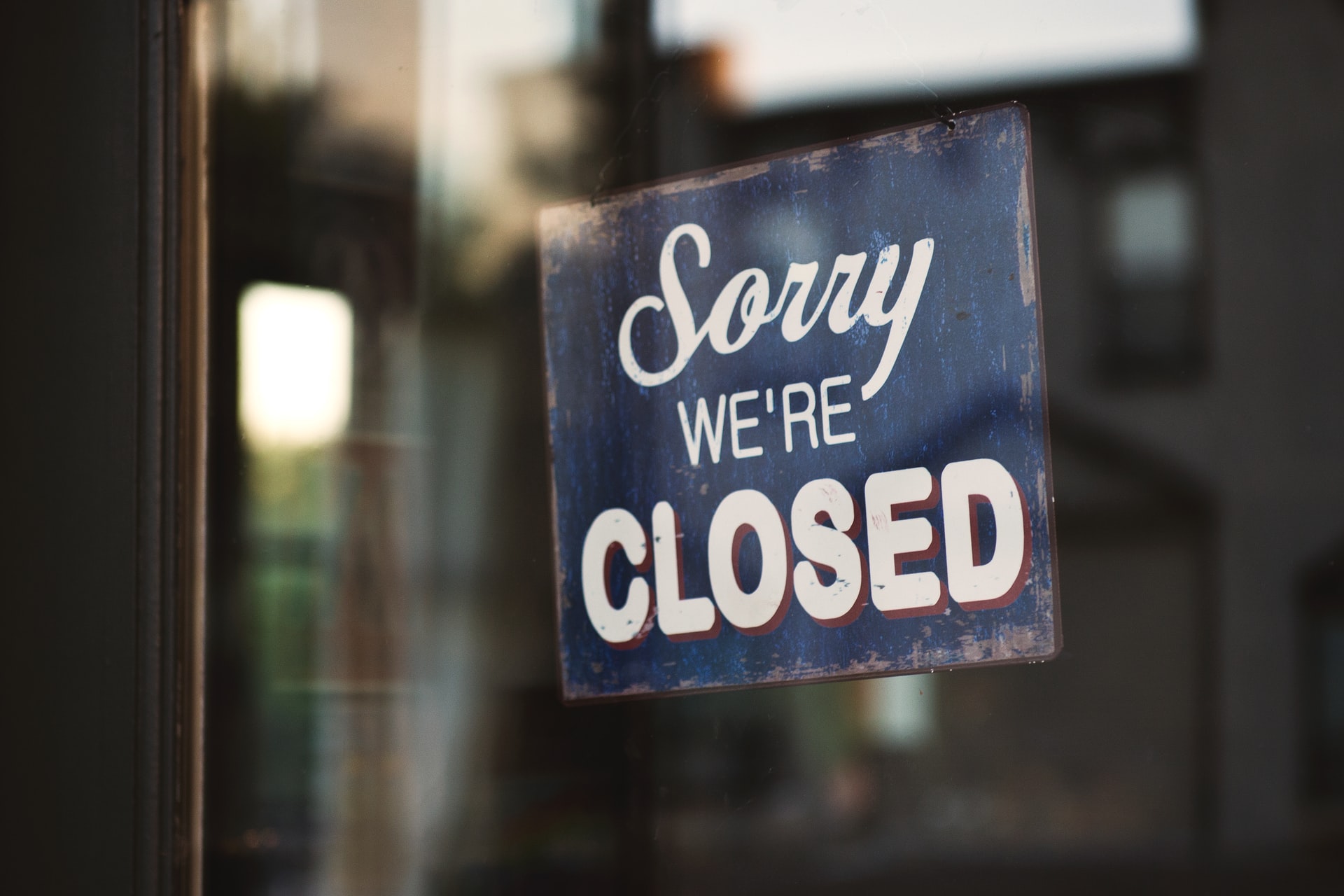 Sorry we're closed window sign
