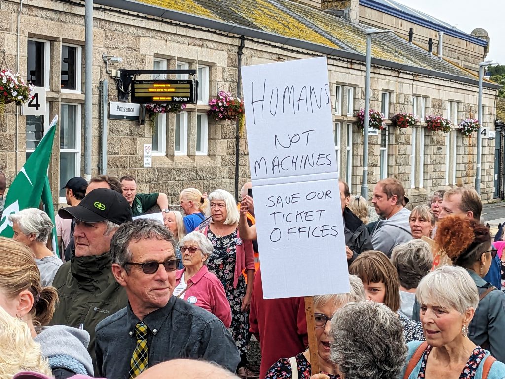 Crowds gather at the 'Save Our Ticket Office' Demonstration outside Penzance Train Station (9 August 2023)