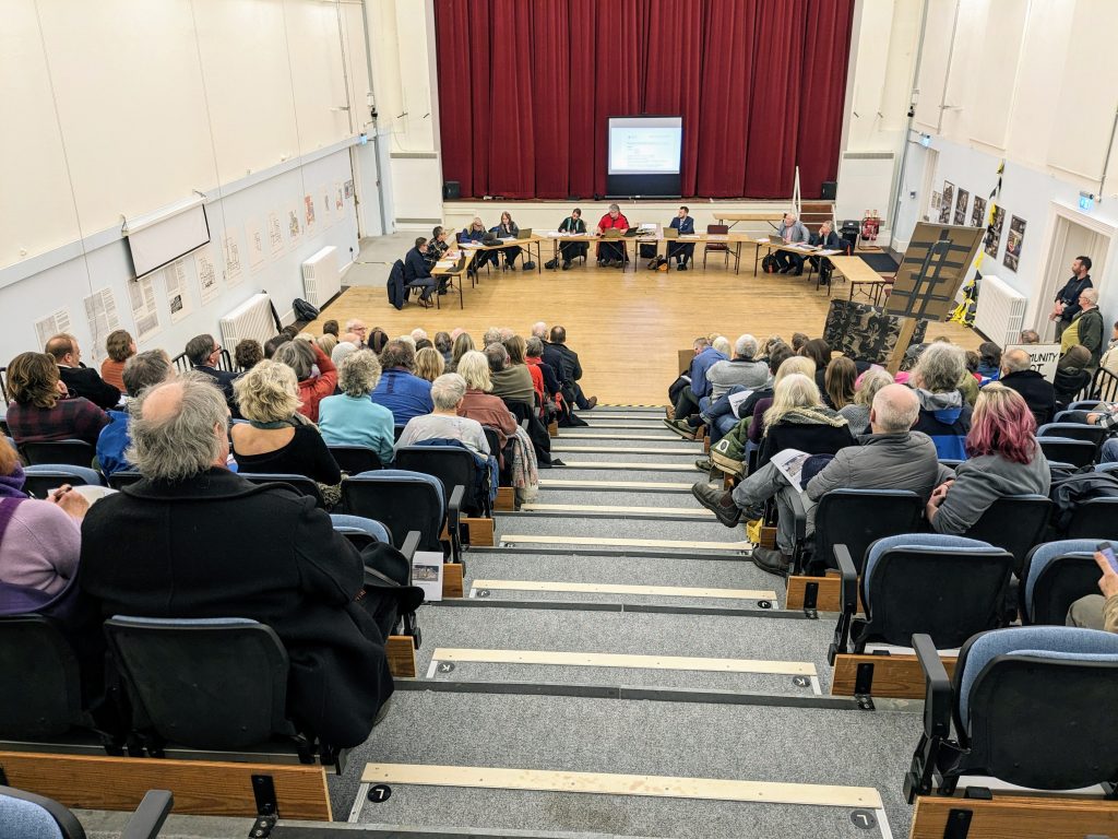 Local residents sat on the tiered seating in St John's Hall for the Penzance Council Planning Committee Meeting to consider the Coinagehall Street Development planning application
