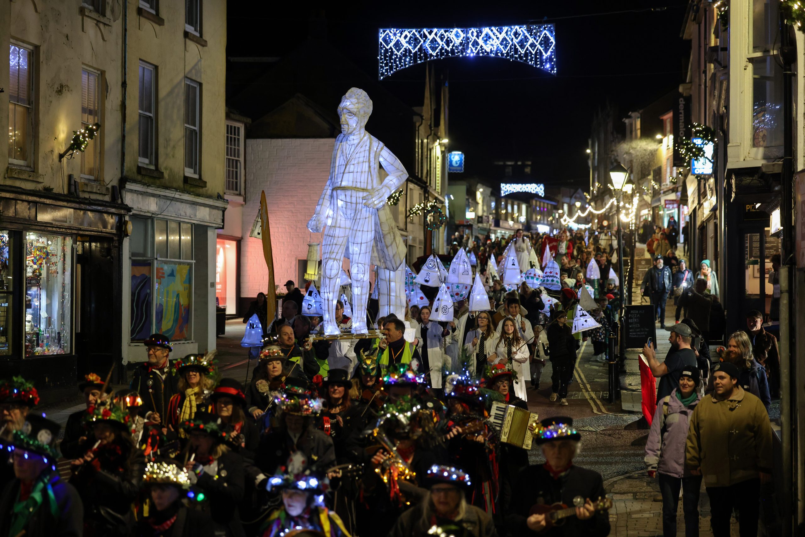 Hundreds sing Happy Birthday to a statue at Humphry Davy Lantern Parade
