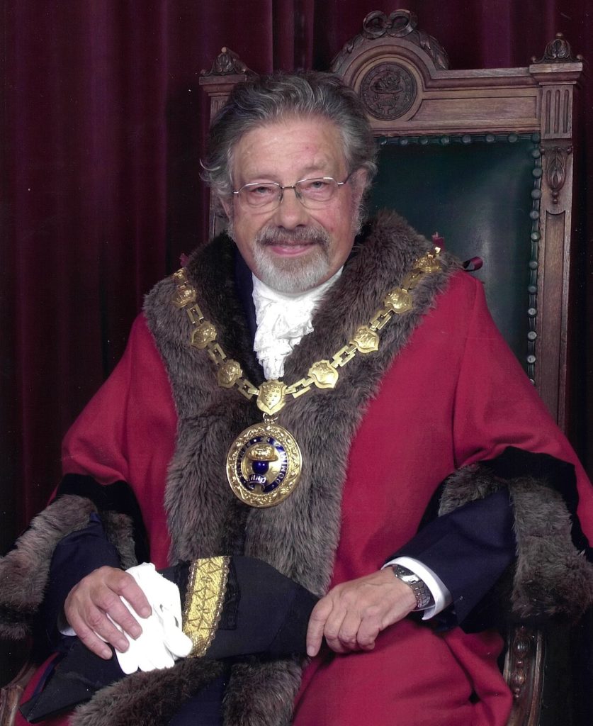 Former Mayor, Cllr Phil Rendle, sat on the Mayor's Chair in full civic regalia